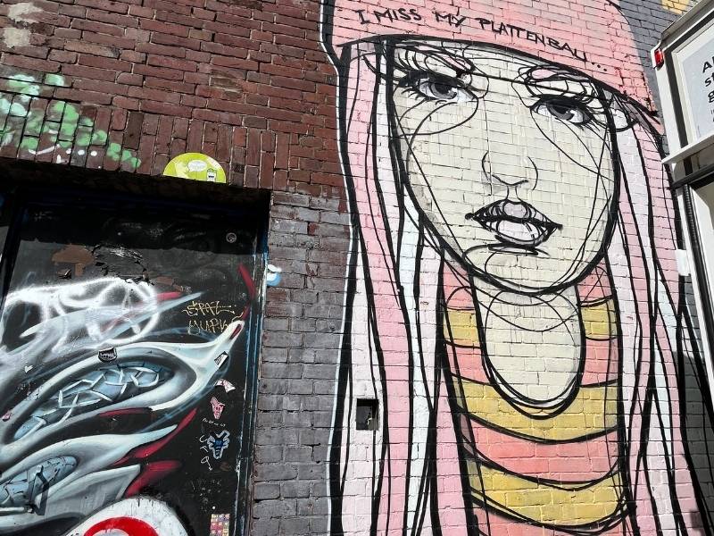 Graffiti in Köln (Mädchen mit Mütze)